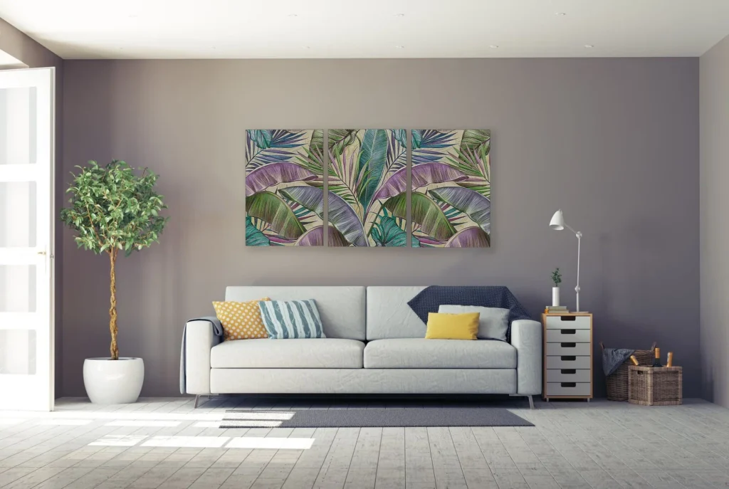 Modern living room with a gray sofa and framed wall art