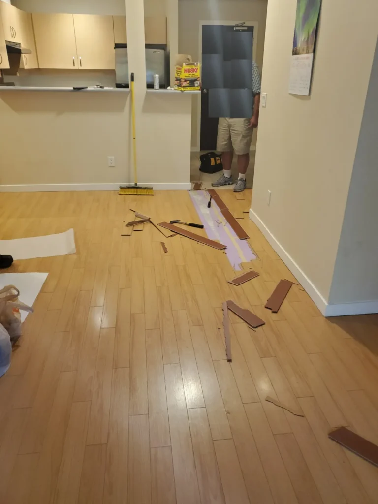 Hardwood floor installation in a hallway